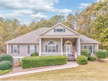 Ranch home with gray siding and stone accents at 408 Gray Fox Dr, Canton, GA 30114