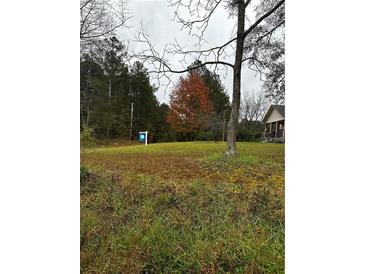 Photo one of 5693 Se Groovers Landing Rd Acworth GA 30102 | MLS 7484577