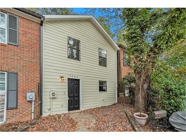 Updated townhome with fresh paint and landscaping at 7004 Pat Mell Se Pl, Smyrna, GA 30080