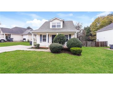 Charming one-story house with a well-manicured lawn and front porch at 417 Tina Hely Ct, Stockbridge, GA 30281