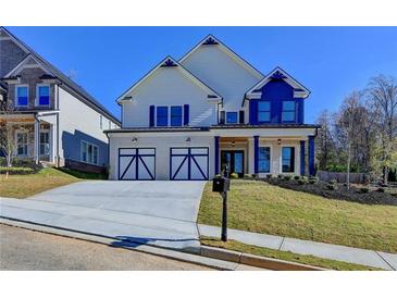 Two-story house with white and blue exterior, three-car garage at 3757 Wasson Way, Brookhaven, GA 30319