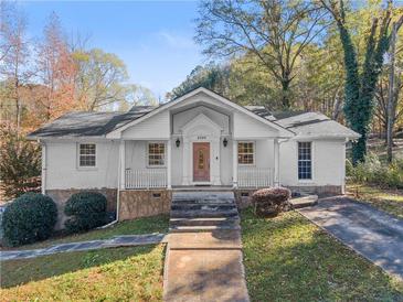 Photo one of 3200 Stonewall Tell Rd Atlanta GA 30349 | MLS 7490591