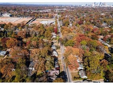 Aerial view of a residential neighborhood showcasing homes with autumn foliage at 921 Byron Sw Dr, Atlanta, GA 30310