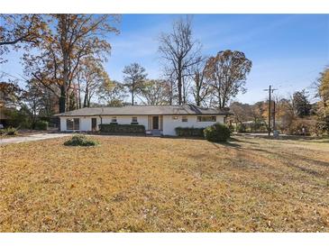 Ranch style home with large yard and mature trees at 2917 Mcafee Rd, Decatur, GA 30032