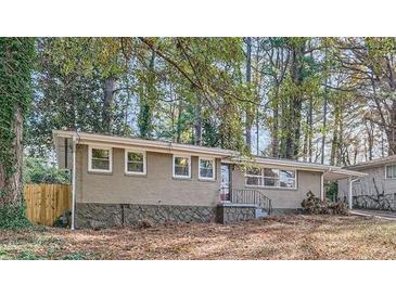 Ranch style home with a newly landscaped yard at 1374 Margarette Dr, Decatur, GA 30035
