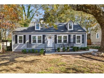 Charming gray house with white trim and landscaping at 2930 Kimmeridge Dr, Atlanta, GA 30344