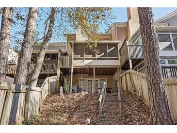 Elevated backyard with wooden deck and screened porch at 3863 Meeting St, Duluth, GA 30096