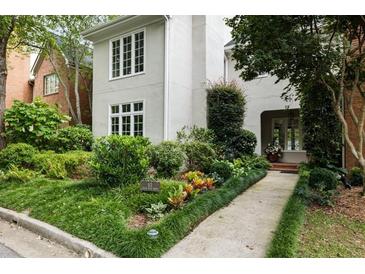 Attractive two-story home with landscaped gardens at 53 Paces West Dr, Atlanta, GA 30327