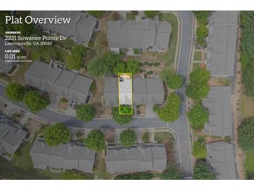 Aerial view of a townhouse community, highlighting the property's location and surroundings at 2331 Suwanee Pointe Dr, Lawrenceville, GA 30043