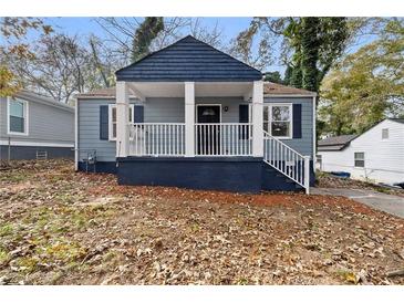 Newly renovated home with blue siding, white trim, and a covered porch at 1417 Graymont Sw Dr, Atlanta, GA 30310