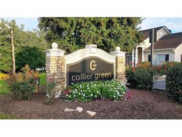 Collier Green community entrance sign with landscaping at 1150 Collier Nw Rd # 4B, Atlanta, GA 30318