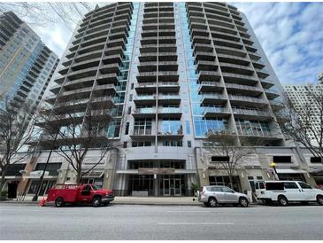 Modern high-rise building with balconies and ground-floor retail space at 950 W Peachtree Nw St # 902, Atlanta, GA 30309