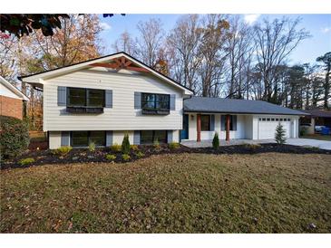 Newly renovated ranch home with modern exterior and landscaping at 175 Jayne Ellen Way, Alpharetta, GA 30009