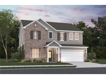 Two-story home with brick and siding, two-car garage, and landscaped lawn at 7640 Homer Dr, Cumming, GA 30028