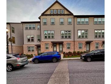 Attractive townhomes in a neighborhood development at 3963 Allegretto Cir, Atlanta, GA 30339