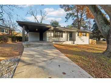 Charming single-Gathering home with a covered carport and driveway at 2385 Tilson Rd, Decatur, GA 30032