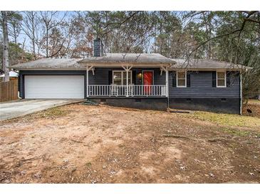Ranch style home with gray siding, white trim, and a red front door at 155 Meadowbrook Dr, Mcdonough, GA 30253