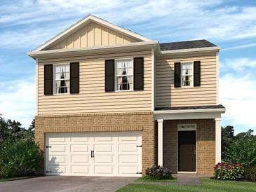 Two-story house with beige vinyl siding, brick base, and a two-car garage at 215 Oak View Ln, Dallas, GA 30157