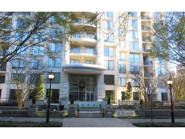 The Paramount condo building, featuring a grand entrance and landscaping at 3445 Stratford Ne Rd # 1908, Atlanta, GA 30326