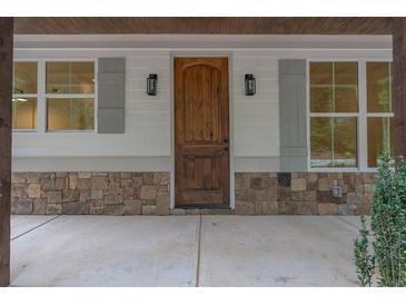 Craftsman style home with stone accents and a charming front porch at 3007 Holly St., Canton, GA 30115