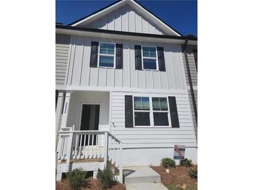 Two-story home with white siding, black shutters, and a front porch at 2822 Saratoga Lake Vw, Decatur, GA 30034