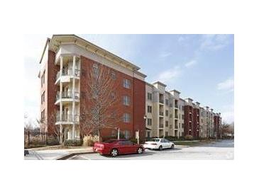 Brick building with multiple floors and balconies at 870 Mayson Turner Nw Rd # 1110, Atlanta, GA 30314
