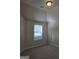 Bedroom with window and carpet at 5696 Laney Dr, Rex, GA 30273
