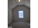Bedroom with window and carpet at 5696 Laney Dr, Rex, GA 30273