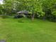 Single-story brick house with a large front yard and driveway at 0 Park Se Ave, Smyrna, GA 30080
