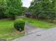 Single-story brick house with a driveway and mailbox at 0 Park Se Ave, Smyrna, GA 30080