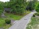 Aerial view of a house situated on a corner lot at Oakdale Rd and Park Ave at 0 Park Se Ave, Smyrna, GA 30080