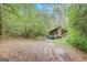 Rustic cabin nestled in the woods at 2421 Bethel Ne Rd, Conyers, GA 30012