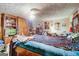 Primary bedroom with large bed and wooden furniture at 2421 Bethel Ne Rd, Conyers, GA 30012