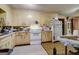 Kitchen with outdated cabinets and appliances at 2421 Bethel Ne Rd, Conyers, GA 30012