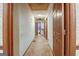 Long hallway with carpeted floors at 2421 Bethel Ne Rd, Conyers, GA 30012