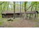View of detached garage and storage shed at 2421 Bethel Ne Rd, Conyers, GA 30012