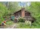 Wooden home with deck and surrounding nature at 2421 Bethel Ne Rd, Conyers, GA 30012