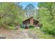 Log cabin home with deck and yard at 2421 Bethel Ne Rd, Conyers, GA 30012