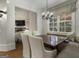 Elegant dining area with built-in window seat and chandelier at 131 Burdette Rd, Atlanta, GA 30327