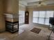 Cozy Gathering room with a fireplace and large windows at 1995 Evergreen Se Dr, Conyers, GA 30013