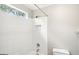 Clean bathroom with a shower/tub combo and tile surround at 5180 Ivy Green Se Way, Mableton, GA 30126