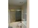 Bathroom with shower/tub combo and vanity at 5878 Nell Ln, Ellenwood, GA 30294
