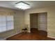 Bright dining room features hardwood floors and a chandelier at 5878 Nell Ln, Ellenwood, GA 30294