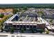 Aerial view of a mixed-use building with parking and commercial spaces at 557 Veterans Pkwy, Fayetteville, GA 30214