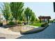 Community water fountain with surrounding landscaping and seating at 557 Veterans Pkwy, Fayetteville, GA 30214