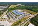 Aerial view of a school with a large parking lot at 557 Veterans Pkwy, Fayetteville, GA 30214