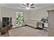 Home office featuring a sofa, workspace, and plenty of natural light at 4505 Cochran Mill Rd, Fairburn, GA 30213