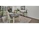 Formal dining room with dark wood table and neutral decor at 4505 Cochran Mill Rd, Fairburn, GA 30213