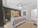 Spacious bedroom with a unique headboard and ceiling fan at 4505 Cochran Mill Rd, Fairburn, GA 30213