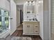 Simple bathroom with a white vanity and tiled walls at 4505 Cochran Mill Rd, Fairburn, GA 30213